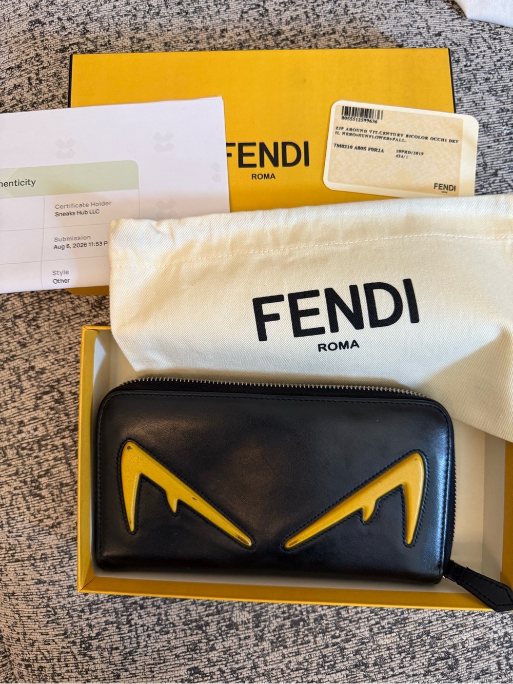 Fendi Black Leather Zip Wallet with Yellow Eye Motif